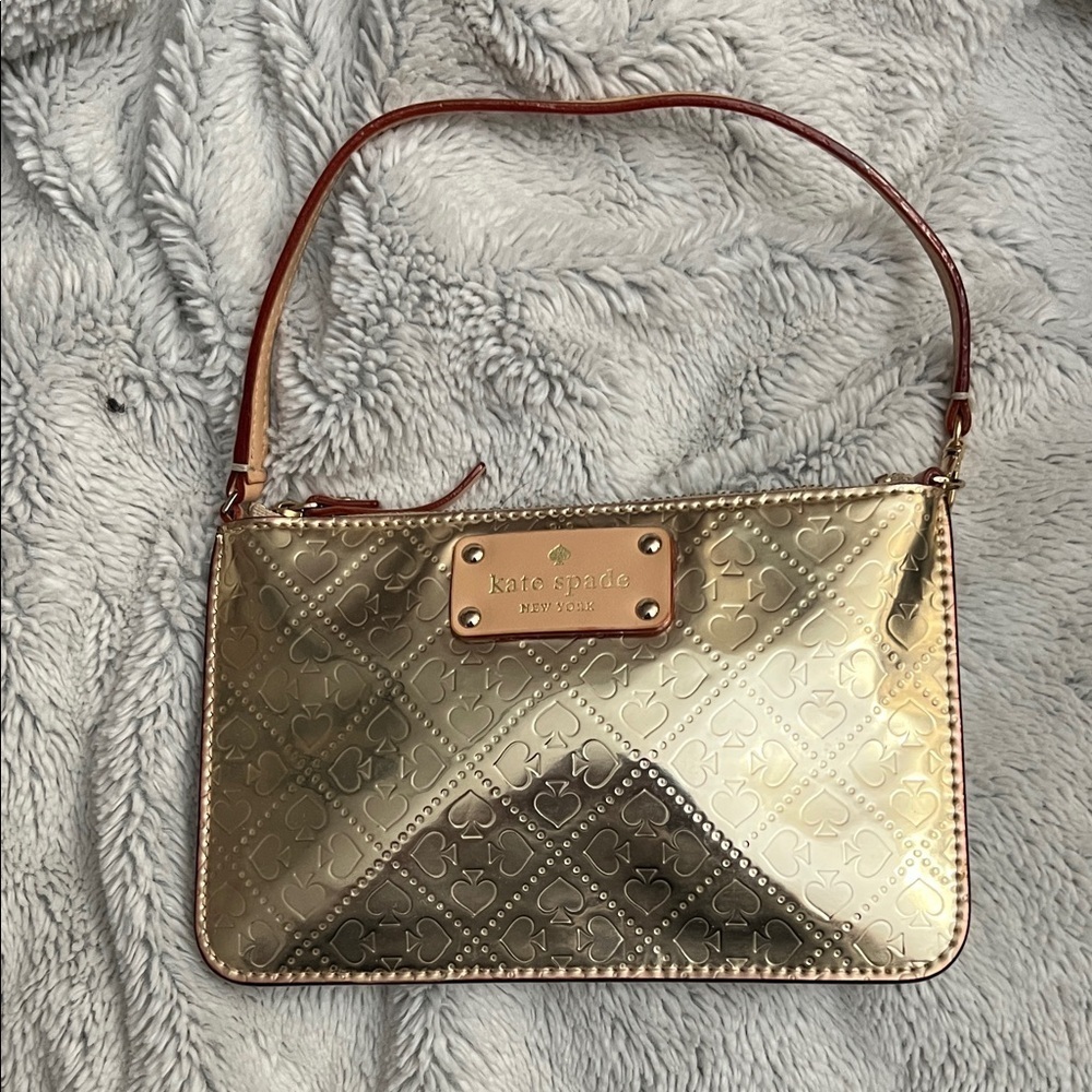 Like new Kate Spade Metallic Gold Clutch